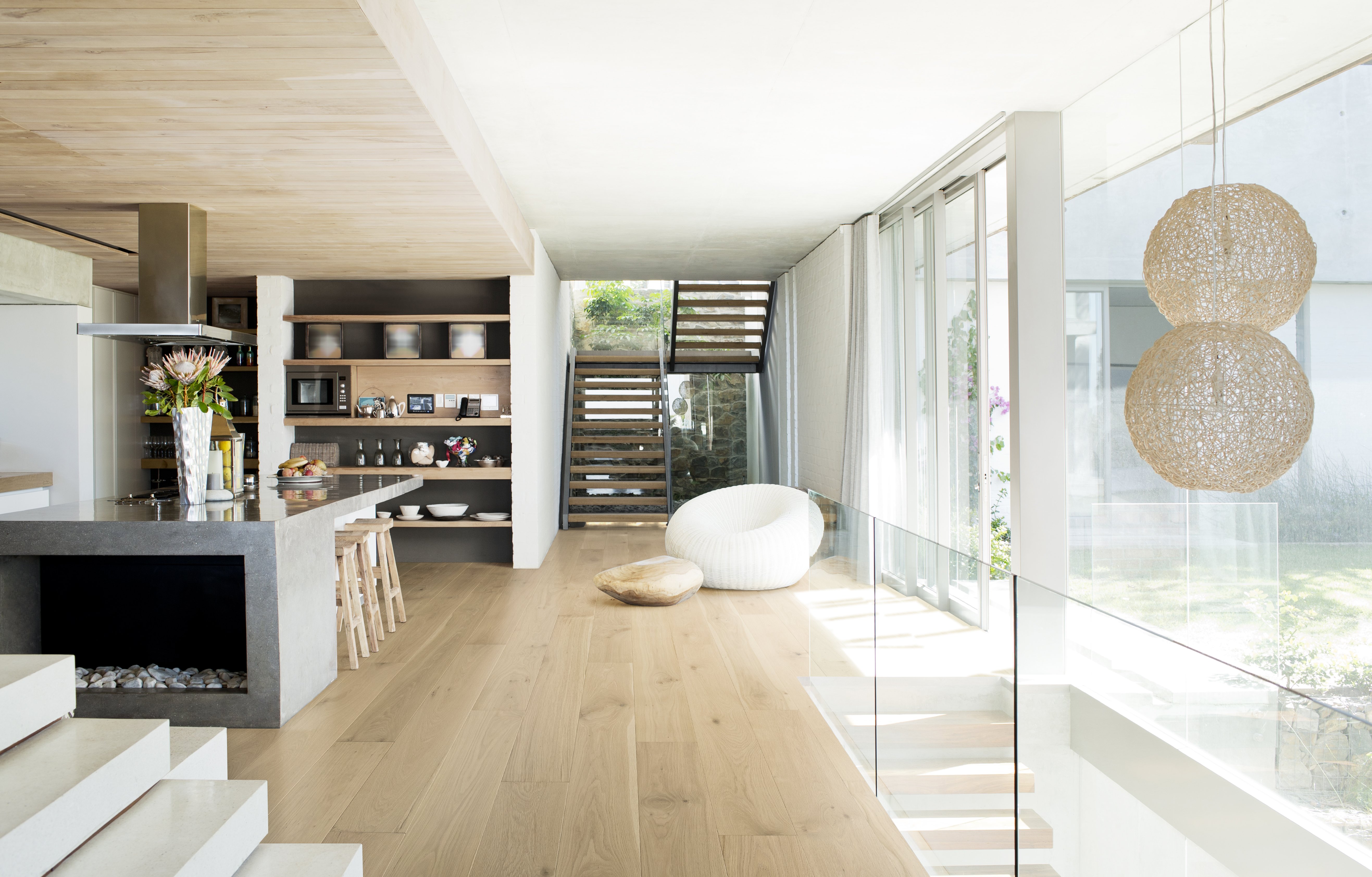Wide-plank oak hardwood floor in a sunlit room